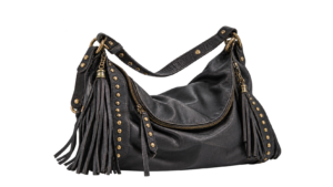 A slouchy leather motorcycle-style bag with studs and tassels