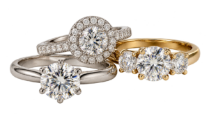 A few diamond rings: solitaire, halo, three-stone