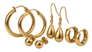 Pairs of gold earrings: hoops, studs, drops and huggies