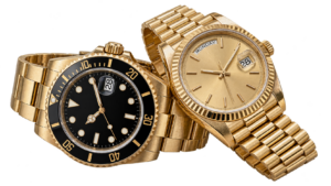 A luxury swiss diver and a gold day-date style watch